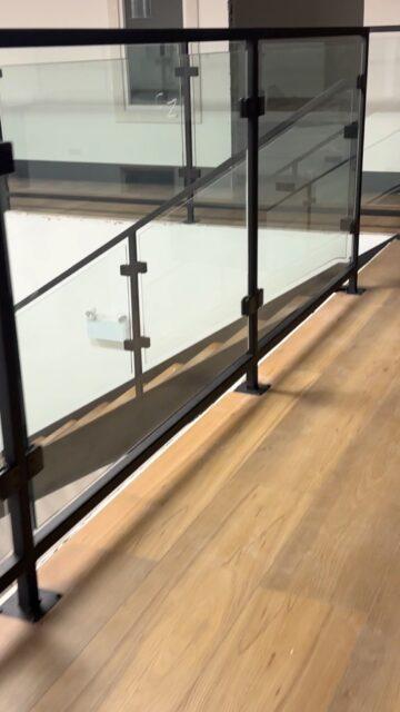 Inside Metal Staircase with Flat-Top Glass Railings #ArtMetalWorkshop #MetalStairs #GlassRailings #InteriorDesign #ModernStairs #SteelStairs #TorontoHomes #CustomFabrication #HomeRenovation #MadeInCanada