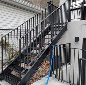 outdoor metal stairs with landing