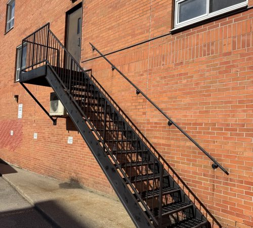 fire-escape-staircase-brick-building-black-escape-stairs